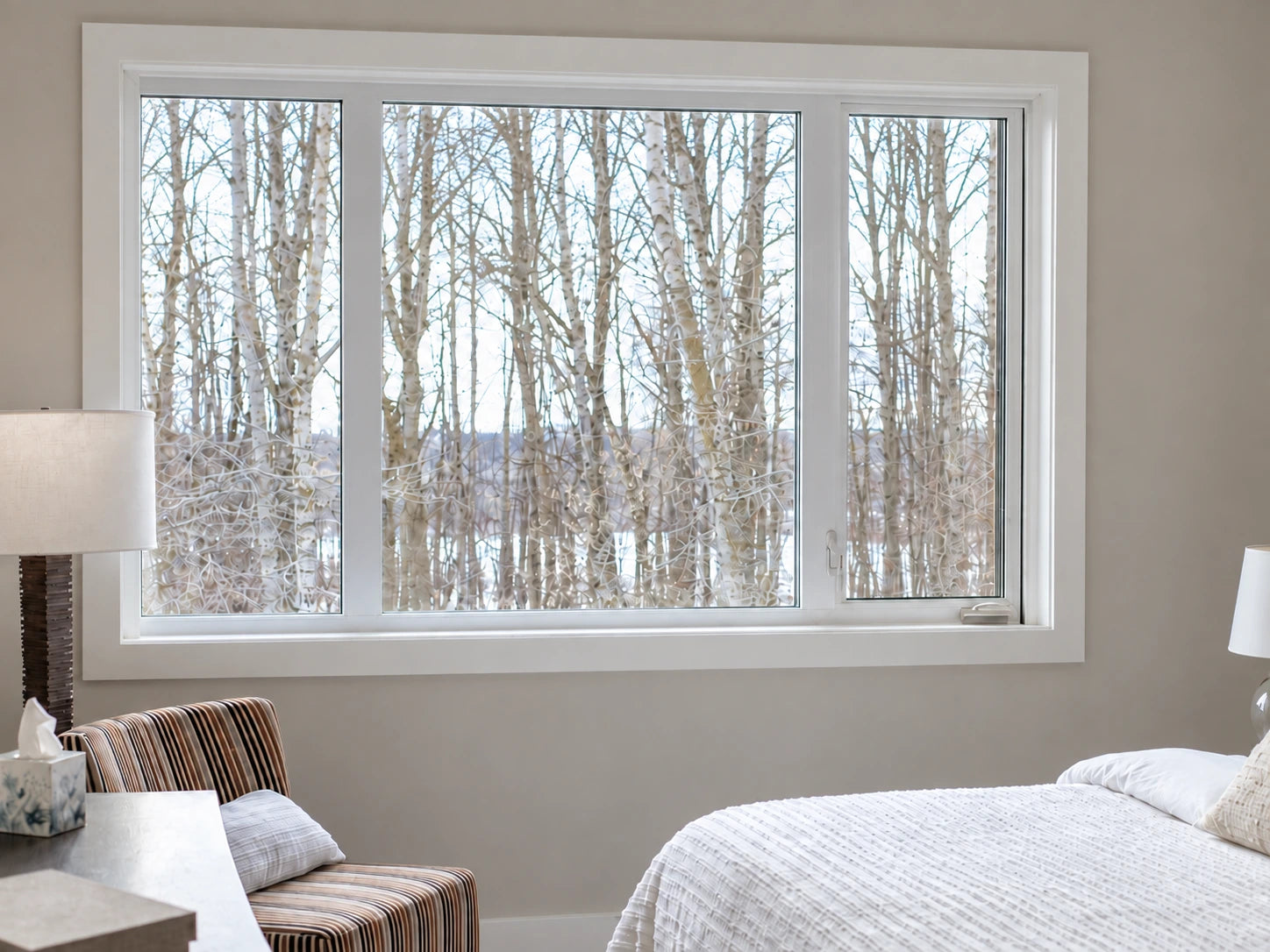 Illustrative bedroom window with a wide recess spanning three glass panels.