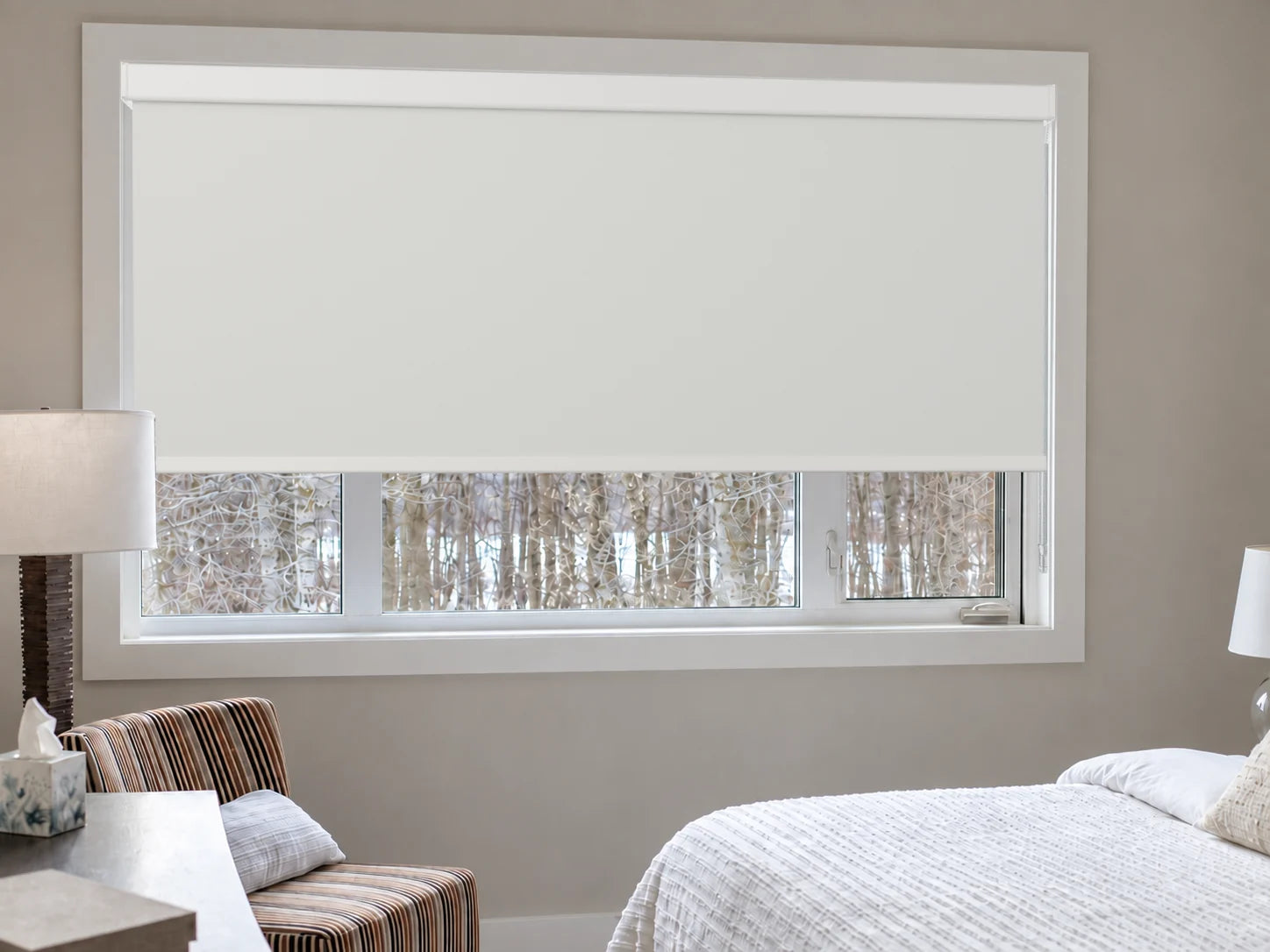 Illustrative Linen White light-filtering roller blind in the approved Novo bedroom.