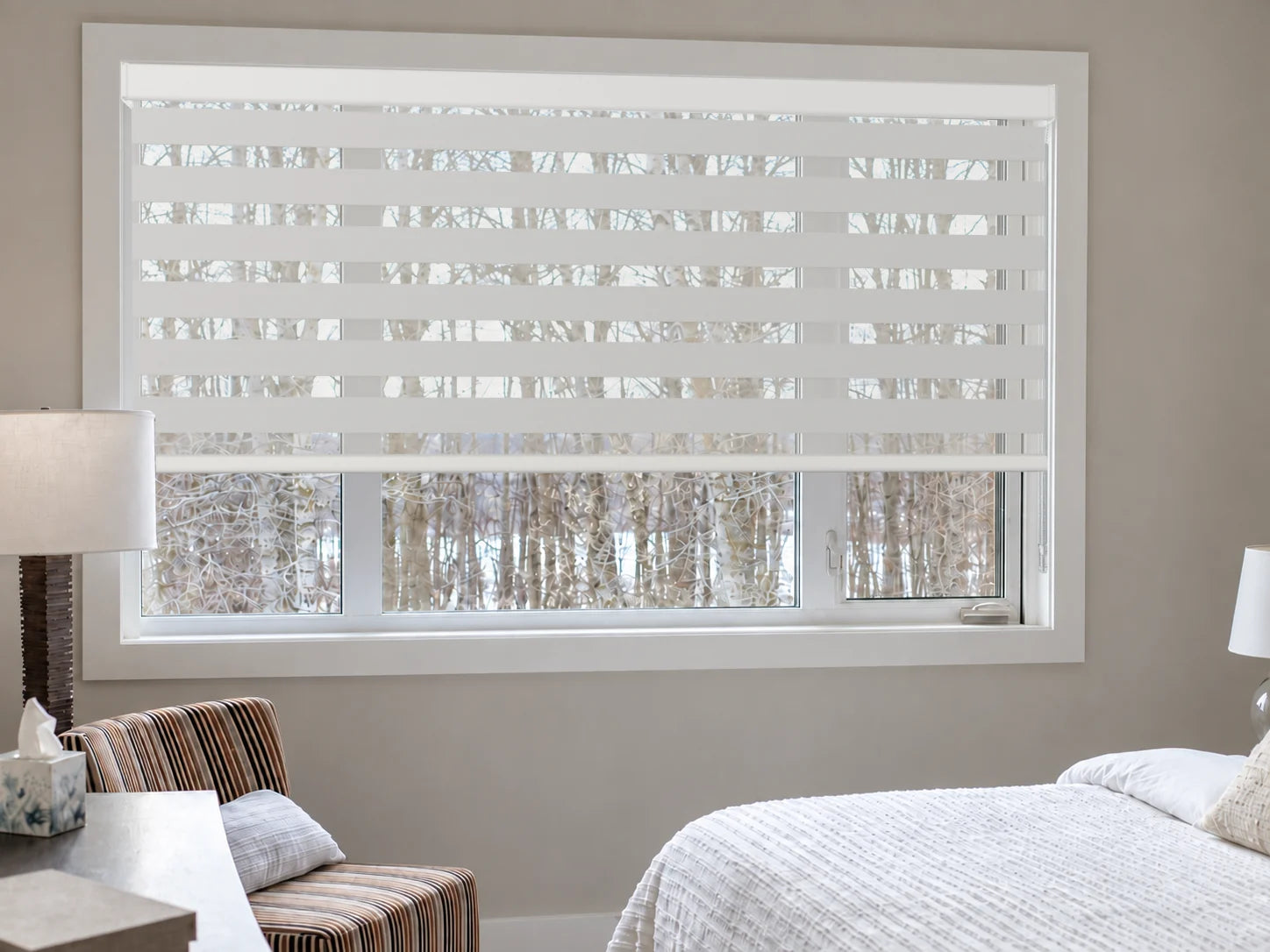 Illustrative Twist Dove White zebra blind in the approved Novo bedroom.